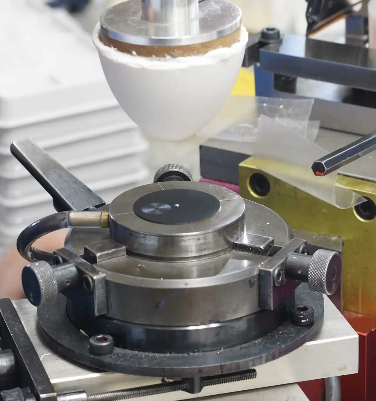 is then used to press the markings onto the dial